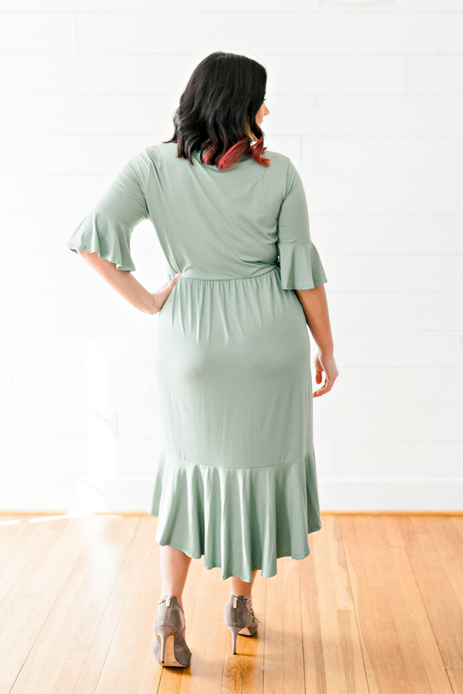 The Maggie Millan- Sage Colored Bell Sleeve Midi Dress